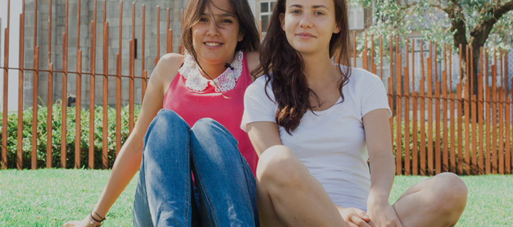 photo of two young women smilling